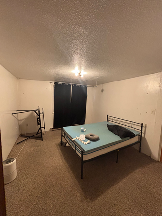 Bedroom (minor damage) I will be taking this room - Kamins Apartments