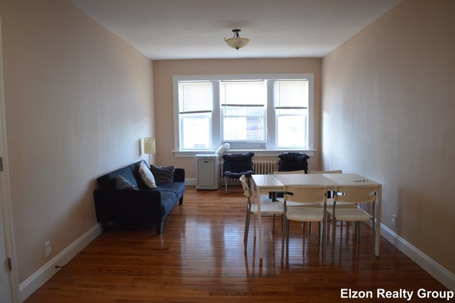 living room - Updated 10/8/25 Fully renovated 3 bed on Comm, Washer/dryer in unit, South St shuttle, 2026 Move in Condo