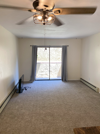 Living Room - $1,200 - 1 Bedroom 1 Bathroom Apartment In Grand Junction With Great Amenities