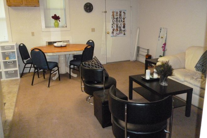 Living/Dining Area - Mountain Village - Walk to class! Apartments