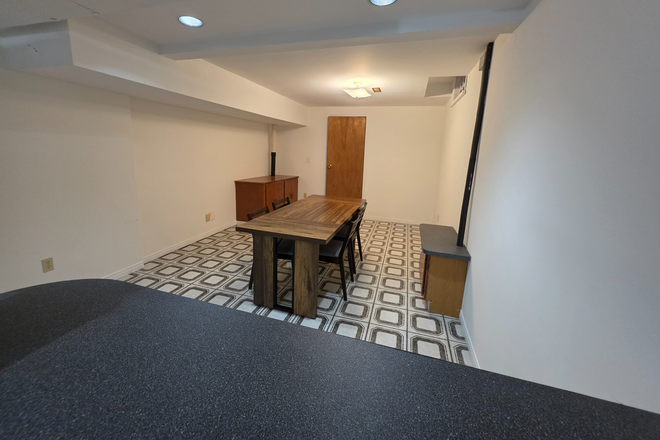 Kitchen view from island - 2 Furnished Bedrooms-Large Dine-in Kitchen, Amenities, washer/ dryer WiFi and dining table included House