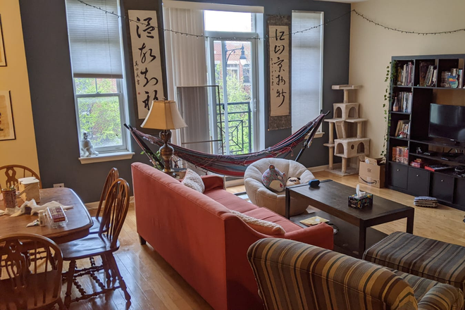 Bookcase and TV, French Balcony for morning light - 2 Bedroom, 4 Bed Furnished Apartment