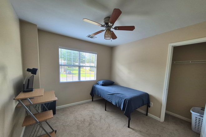 Bedroom 1 – furnished with bed, desk & ceiling fan - Furnished Rooms in Quiet Owner-Occupied Home + Wi-Fi + Utilities Included