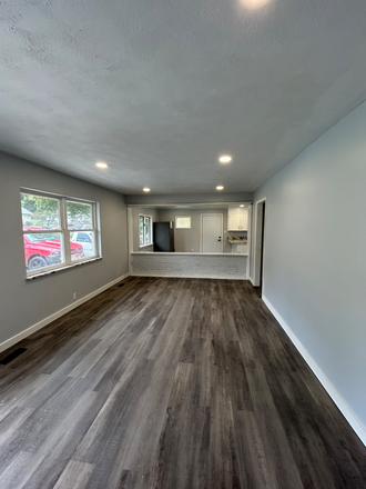 Large Living Area - Large 2BR/2BA Near Campus — Fenced Yard + Driveway Parking+Walking Distance to Park Duplex