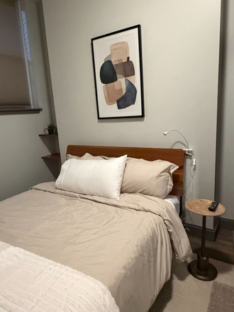 Bedroom - Fully Furnished Studio Available One Block from Peabody Shuttle Stop Apartments