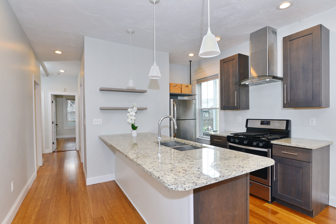 Kitchen - Amazing East Side location- in unit laundry, private deck, central AC Apartments
