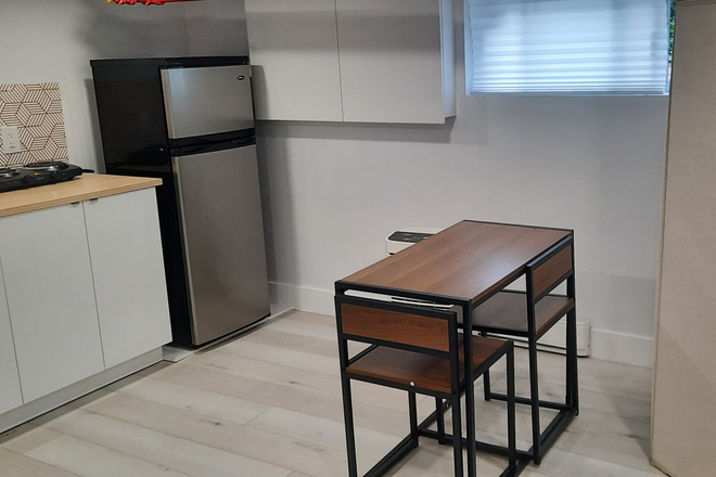 Kitchen and dining/ living room - Basement small one bedroom furnished apartment available from March 1