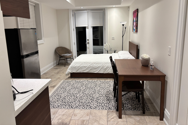 Bedroom - Cozy studio in a new house near Subway. Wi-Fi, laundry, all utilities and parking included