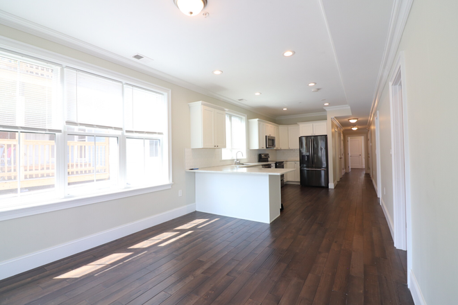 kitchen - Modern JP 4 bed/2 bath with in unit laundry, AC, and a deck - NO FEE!