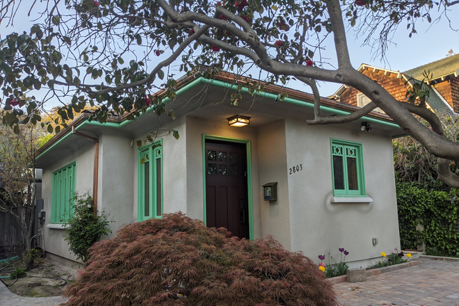 View from the driveway of the entry - Craftsman Bungalow in the Elmwood Apartments