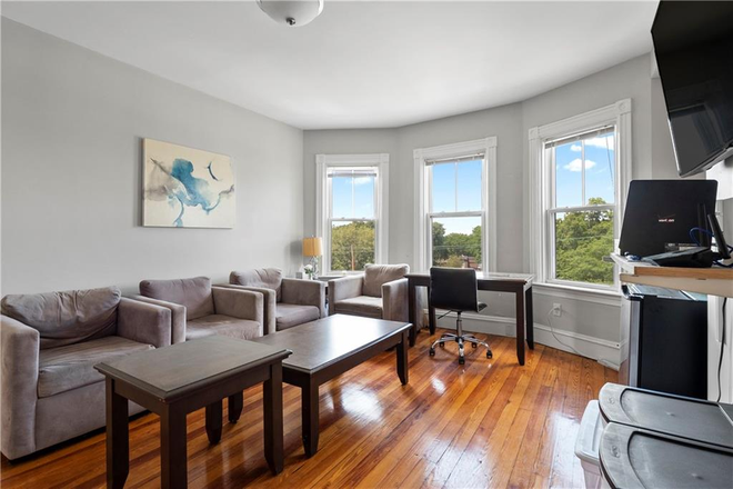 Living Room - Spacious, Furnished Multi Level 7 Bed 3 Bath Triplex