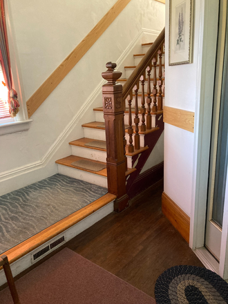 Stairs leading to second and third floor apartment - Join grad students  - walk to campus Triplex