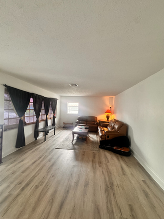 living room - Looking for other college students to live with in this House. Walk to School