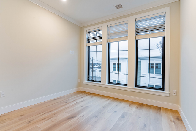living room - New Construction 4-Bedroom Apartment in Prime Allston Location