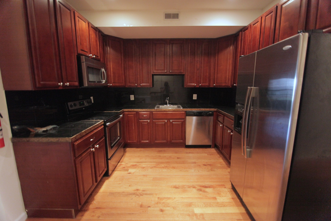 Kitchen - OCP - Best And Safest Location In a Bright 6 Bed 4 Bath Unit Apartments