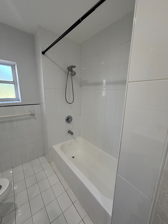 SHOWER/TUB COMBO - 5 Bed/ 2.5 bath pool home with yard and laundry