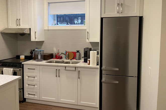 Kitchen - 1 Cozy Fully Furnished Bachelor Apartment, with private washroom and kitchen