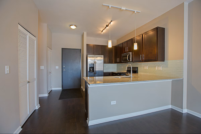 Kitchen viewed from living room - 1 Br/1 Ba sublet one mile from campus Apartments