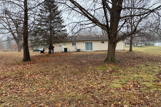 Backyard view from property line - 3 Bed 2 Bath Next to City Park, Close to Campus, Hospital House