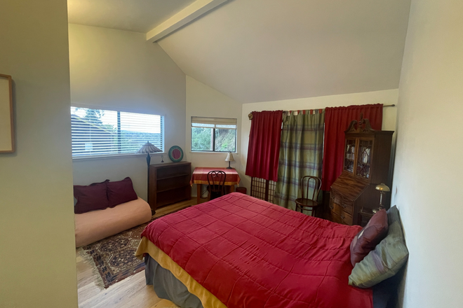 Master Bedroom with windows! Plenty of light. - Master bedroom with private bathroom attached in charming condo in quiet neighborhood