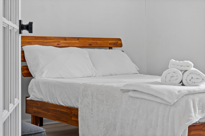 Bedroom - Live steps from UNCW—Modern, furnished 1BR with Wi-Fi & in-unit laundry and no fees! Condo