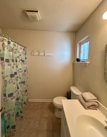 bathroom view from room. - Planters Place Mount P Condo