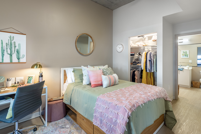 example of a bedroom in the apartment building - Oliv Tucson Apartment w/ Private bathroom