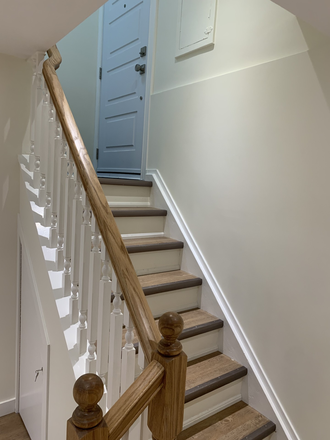 Separate entrance staircase to unit - Rec renovated bsmt apt/1 bdrm+work area/4 pc bath/full kitch/shared laund + yard/sep. ent/1 car prk