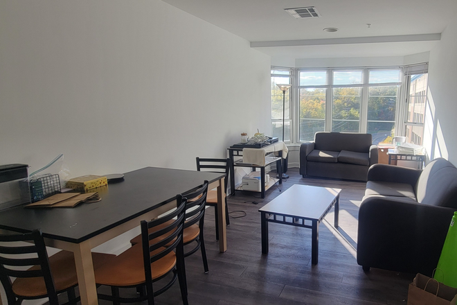 Living Room - South Campus Commons 7 release. 5th floor, male roommates, 4 bed 2 bath. Apartments