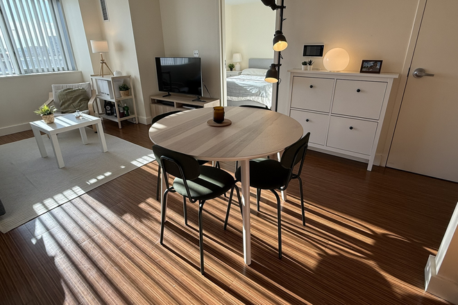 Dinning table - Fully Equipped 1BR Apartment on HBS Campus