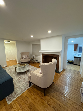 Licing Room - Maplewood Rare 2-bedroom duplex with parking, outdoor space, and flexible bonus areas Duplex