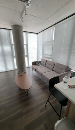 Living Room/Corner Apt Living Space - RISE on Chauncey Apartments