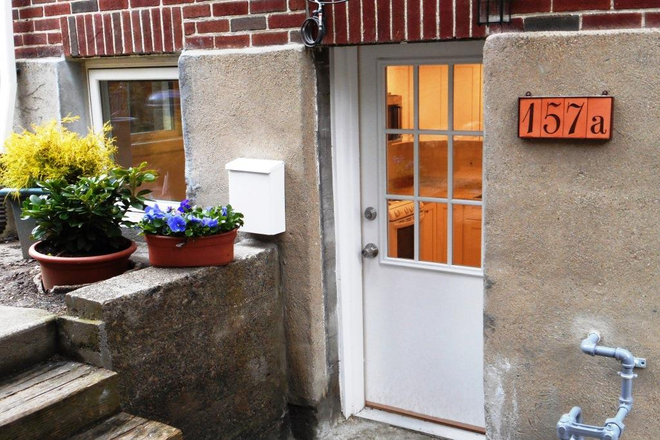 front door, 60 feet back from street - 1-bedroom apartment in Cambridgeport two-family, ideal location, lots of privacy, yard and laundry