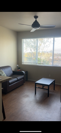Living Room - Puerta Del Sol 2 Bed 2 Bath Apartments