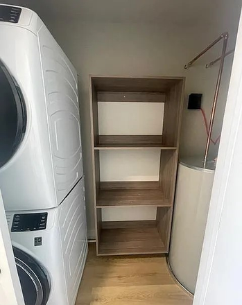 washer/dryer utility room - Brand New Two-Bedroom Apartment