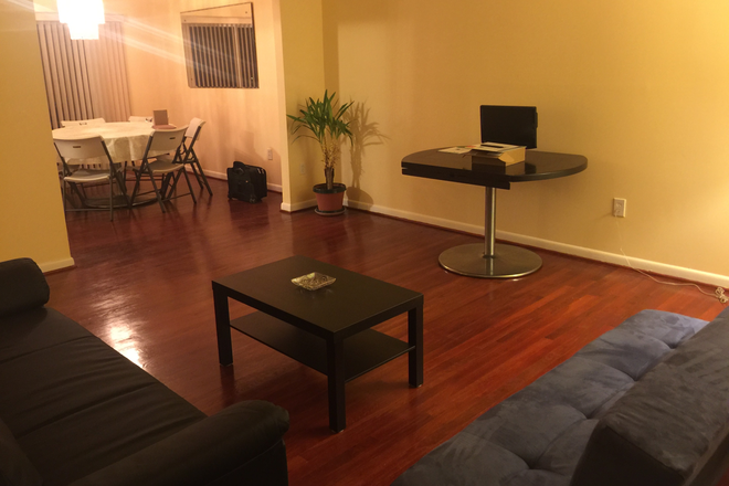 Family room and dining room - A recently renovated rental house  for UMD students