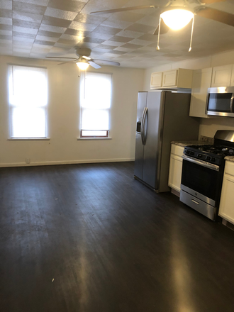 Spacious eat-in kitchen features stainless appliances. - Spacious four bedroom, two and a half bath home with attached oversized two car garage.