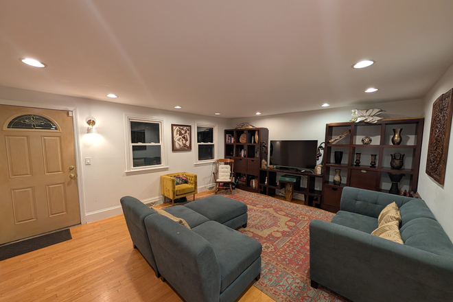 Living Room - Incredible 4BR at top of Fort Hill! Condo