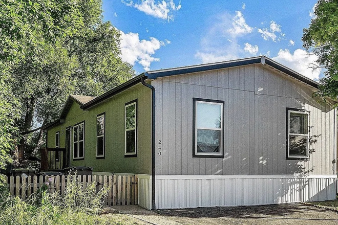 Outside street view with parking - Furnished, Utilities, Internet & Streaming Services included!