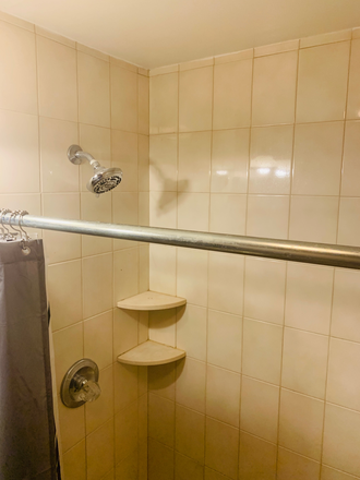 shower area - A quiet and peaceful dormer style apartment located in Levittown. Smoke, drug and pet FREE