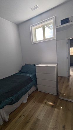 bedroom - 1 Furnished Bedroom, A.C included, Main and Danforth, steps away from subway and Go Apartments