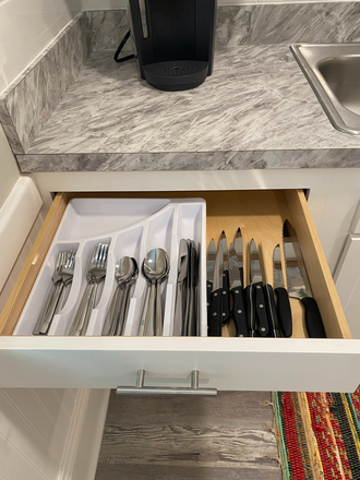 Kitchen silverware - Five bedroom newly remodeled fully furnished/appliances included. Close to Campus. Duplex