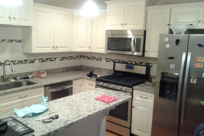 Kitchen - Furnished Room in rowhome within 10 minutes of JHU Medical Campus, includes utilities!