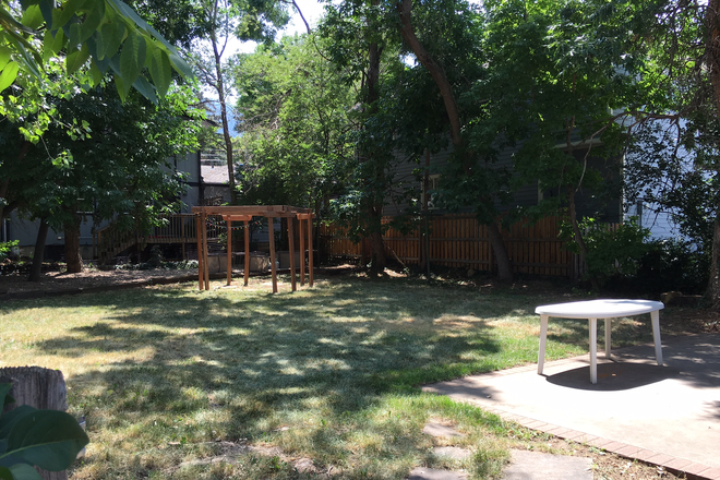 Backyard - Fall 2026 pre-lease 4-br house between Hill & Downtown. Walk everywhere!
