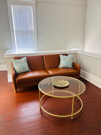 Additional Social Area: w/sleeper sofa leading to the enclosed sun porch. - Fully Furnished Flat For Rent Apartments