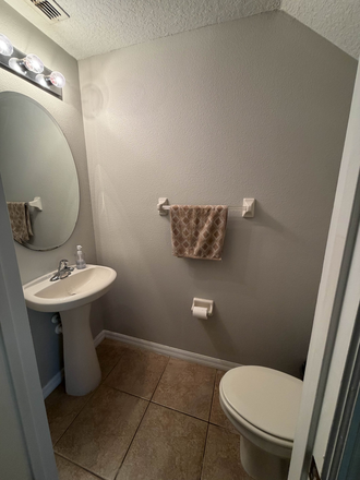 Downstairs half-bathroom - Hawthorne Glen Apartments