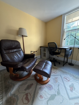 Sitting room/study. "Stressless" recliner, Desk and chair - *NEW* 10min walk to BC Law&shuttle/Sunny, quiet, safe, cozy. Util/laundry inclu. No fees. Pkg avail. Apartments