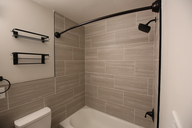 Shower - 2444 S York - Remodeled 2 Bedroom Units with Parking - Walk to DU - 1/2 Off 1st Month's Rent! Apartments