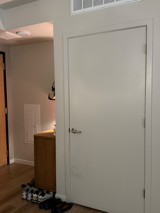 Big storage closet by kitchen and entry way - Oliv Boulder Apartments