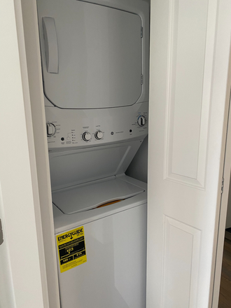 A - 3 BED WITH LIVING ROOM AND LAUNDRY IN UNIT Apartments